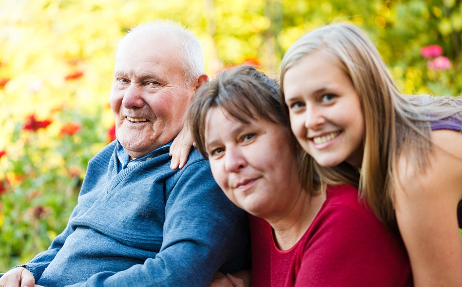 Family visiting grandfather with Alzheimer’s