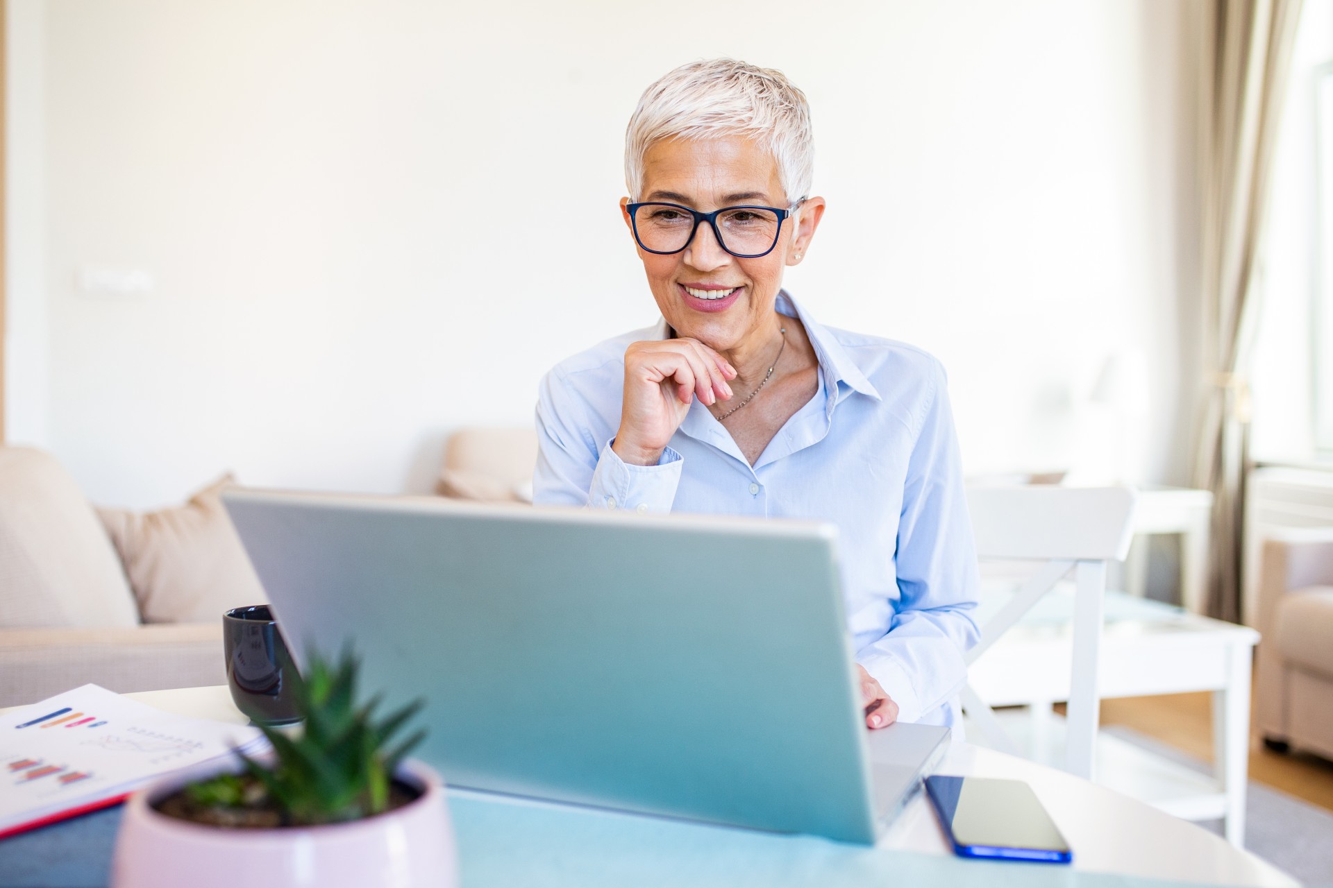Senior woman using her laptop